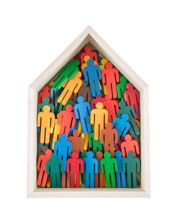 Wooden house with colorful painted figures of people isolated on white backgroundの写真素材