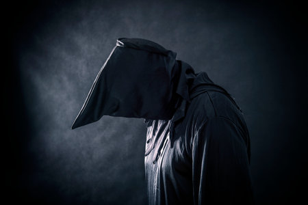 Spooky monster in hooded cloakの写真素材