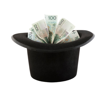 Polish money appearing from a top hat isolated on white backgroundの写真素材