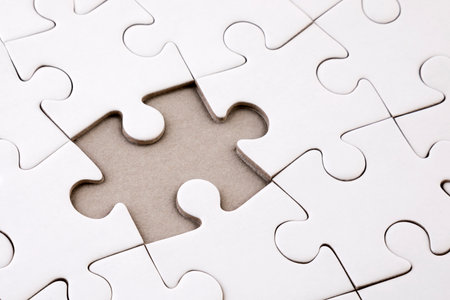 Last piece of jigsaw puzzleの写真素材