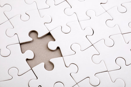 Last piece of jigsaw puzzleの写真素材