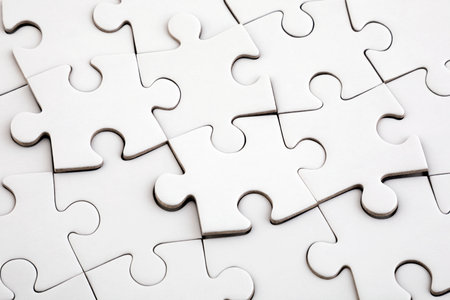 Top view of white jigsaw puzzleの写真素材