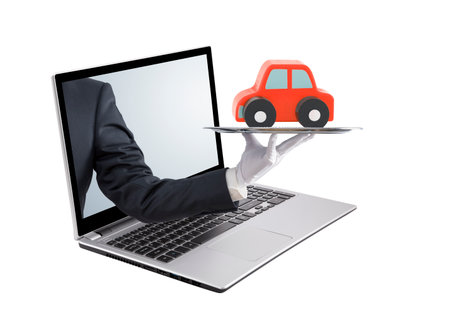 Businessman offering a laptop on a silver screen. Isolated on whiteの写真素材