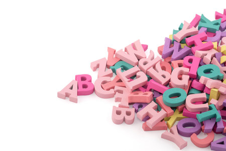 Pile of colorful painted wooden letters. Typography background composition.の写真素材