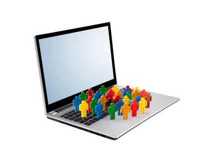 Colorful painted group of people figures on laptop isolated on whiteの写真素材