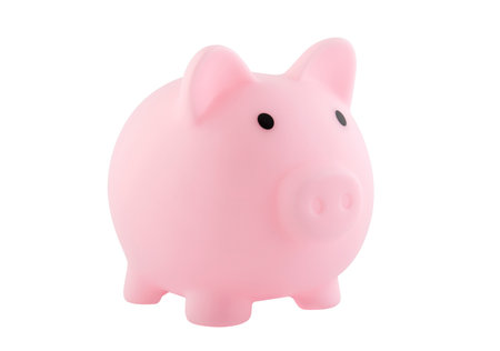 Pink piggy bank isolated on whiteの写真素材