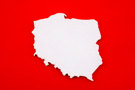 Shape of Poland map over red backgroundの写真素材