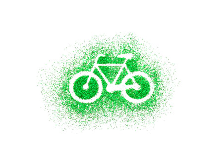 Bicycle shape on green glitter over white backgroundの写真素材