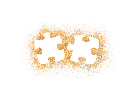 Pair of two matching puzzle pieces on golden glitter isolated on white backgroundの写真素材