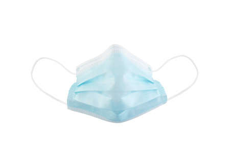 Surgical or medical mask with rubber ear straps against coronavirus isolated on white backgroundの写真素材