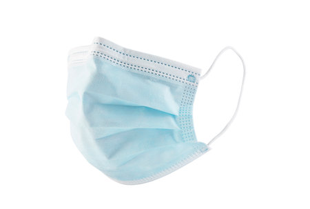 Surgical or medical mask with rubber ear straps against coronavirus isolated on white backgroundの写真素材