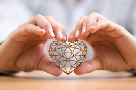 Openwork heart in hands