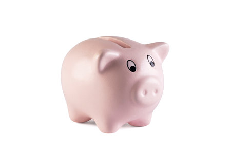 Pink piggy bank on white backgroundの写真素材