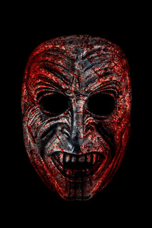 Creepy bloody vampire head isolated on black with clipping pathの写真素材