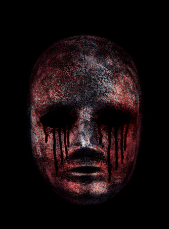 Creepy bloody mask isolated on black with clipping pathの写真素材