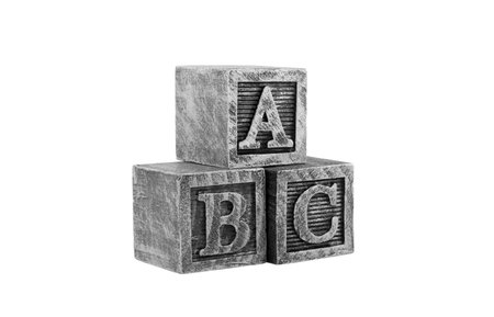 Vintage wooden alphabet blocks isolated on whiteの写真素材