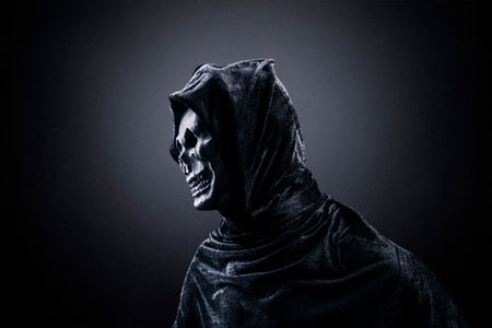 Grim reaper over dark misty backgroundの写真素材