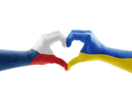 Two hands in the form of heart with Czech and Ukrainian flag isolated on white backgroundの写真素材