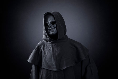 Grim reaper over dark misty backgroundの写真素材