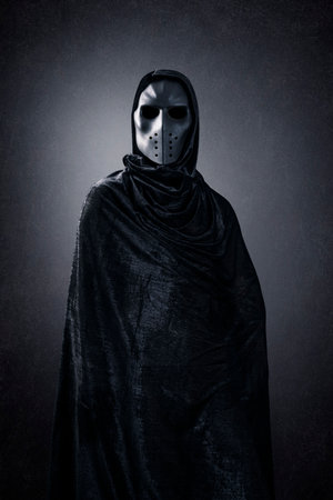Mysterious humanoid alien at night over dark misty backgroundの写真素材
