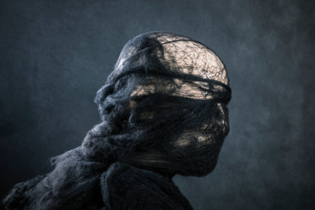 Creepy figure on dark misty backgroundの写真素材