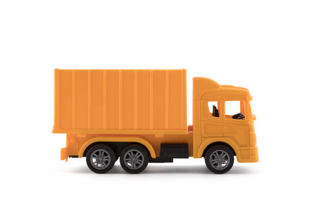 Yellow cargo delivery truck miniature isolated on white background with clipping pathの写真素材
