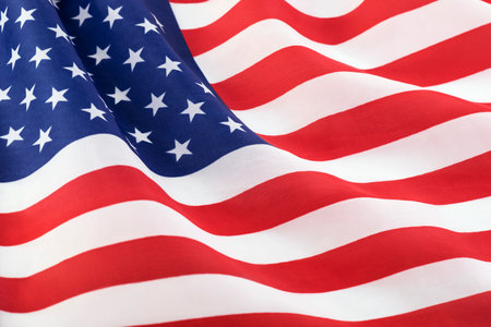 Flag of the United States waving in the windの写真素材