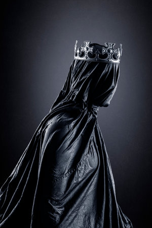 Ghost of a queen or king over dark misty backgroundの写真素材