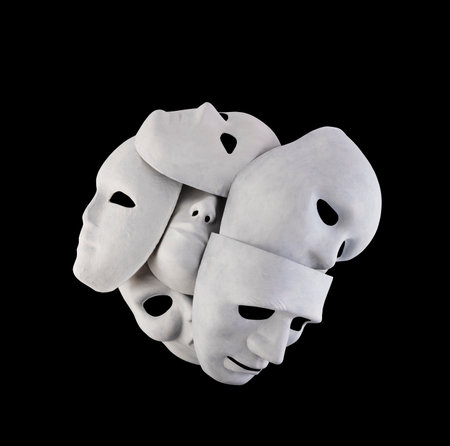 Group of white creepy masks isolated on black background with clipping pathの写真素材