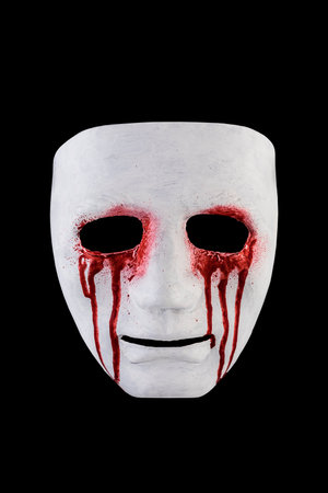 Creepy bloody mask isolated on black background with clipping pathの写真素材