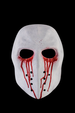 Creepy bloody mask isolated on black background with clipping pathの写真素材