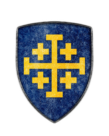 Old metal crusaders shield with cross isolated on white backgroundの写真素材