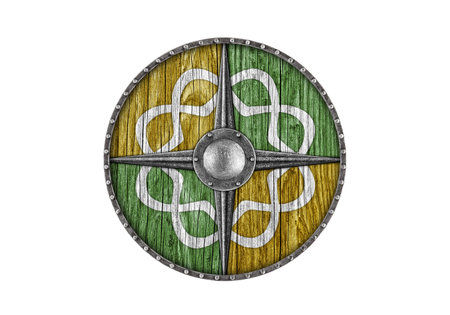 Old decorated wooden round shield isolated on white backgroundの写真素材