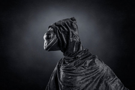 Lizard man over dark misty backgroundの写真素材