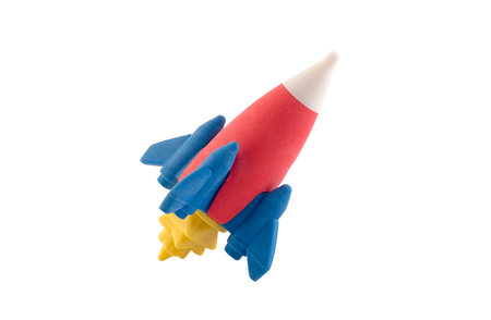 Rocket space ship colorful toy isolated on white background with clipping pathの写真素材