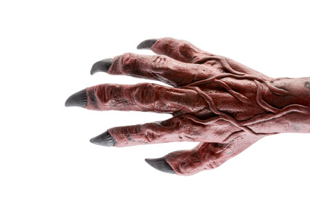 Halloween theme: terrible red zombie hand isolated on white background with clipping pathの写真素材