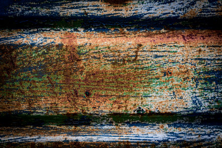 Rusty spot on a metal fence