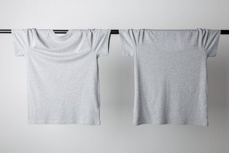 T-Shirts on metal pipe Mock-up, ready to replace your designの写真素材