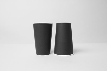 Black paper cups mockupの写真素材