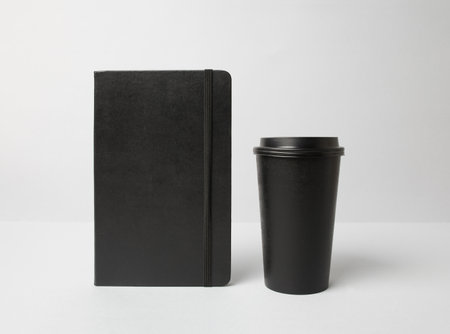 Black paper cup and molekineの写真素材