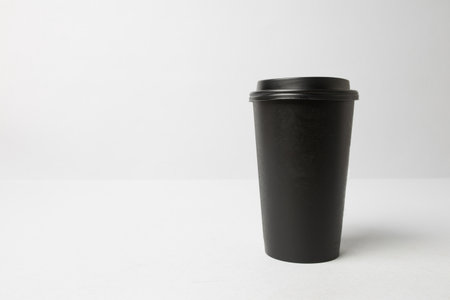Black paper cup mockupの写真素材
