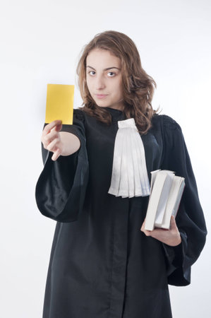 Young law school student showing a yellow cardの写真素材