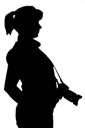 Silhouette of a photographer isolated on white backgroundの写真素材