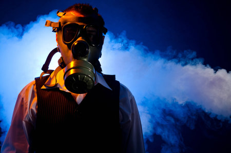 Man wearing a gas mask for protection against pollutionの写真素材