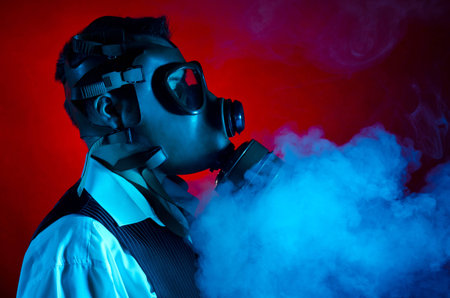 Man wearing a gas mask for protection against pollutionの写真素材
