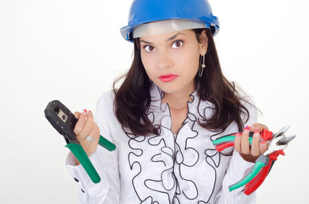 Young business woman chooses the proper toolの写真素材