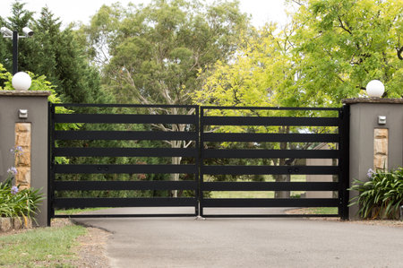 Black metal driveway entrance gates