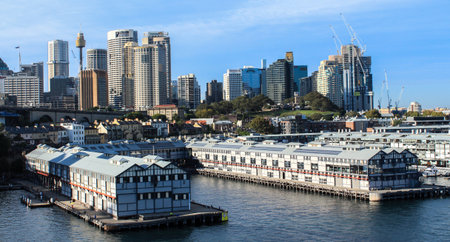 Walsh Bay finger wharves on Sydney Harbour Australia with city buildings in backgroundのeditorial素材