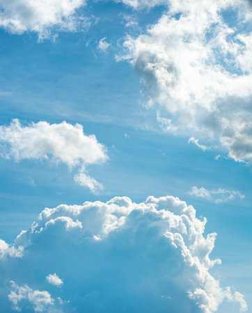 Summer sky. Beautiful blue sky with white clouds. Summer background.の写真素材