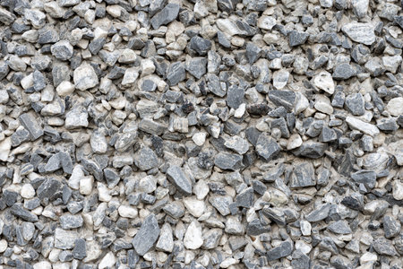 Crushed rock. Texture of gravel stones on ground.